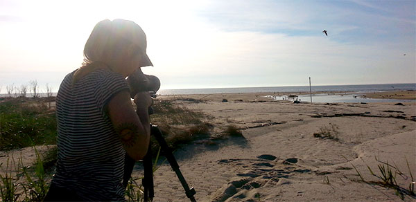 Jill Azzolini taking a photo of a NJ beach