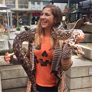 Jill Azzolini holding a wild snake